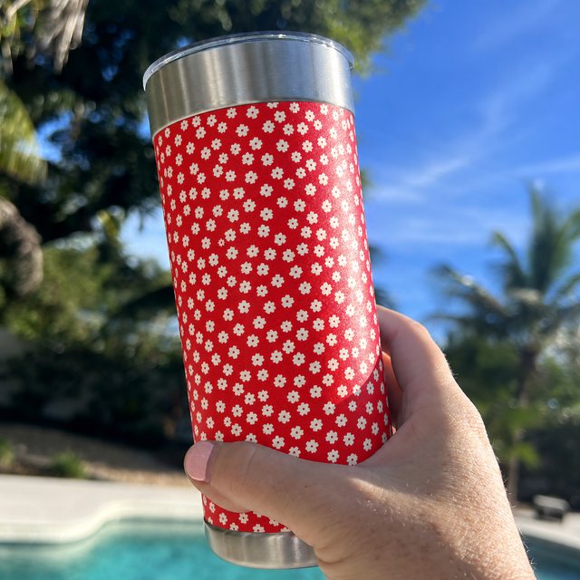 The red-and-cream flower wrap on a Wrapware tumbler.