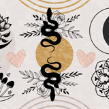 Rattle & Tat wrap artwork with snakes, moons, flowers and tattoo-style symbols on cream.