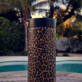 Chocolate Leopard wrap on a black ceramic Wrapware Tumbler poolside