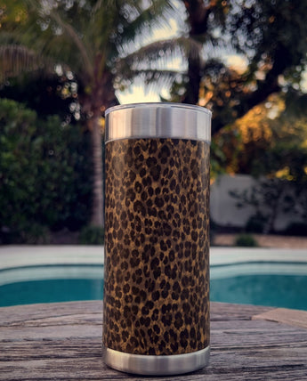 Chocolate Leopard wrap on a stainless Wrapware Tumbler on a poolside table