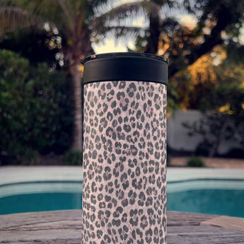 Purrpink Leopard wrap on a black ceramic Wrapware Tumbler poolside