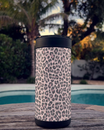 Purrpink Leopard wrap on a black ceramic Wrapware Tumbler poolside