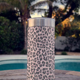 Purrpink Leopard wrap on a stainless Wrapware Tumbler on a poolside table