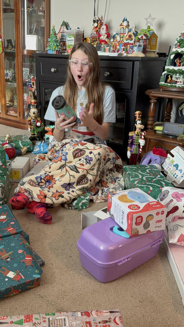 Mary Beth's daughter with her Christmas gift tumbler — 5-star review photo