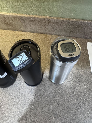 Thermometers in Aaron's tumblers showing one drink ice cold and one hot