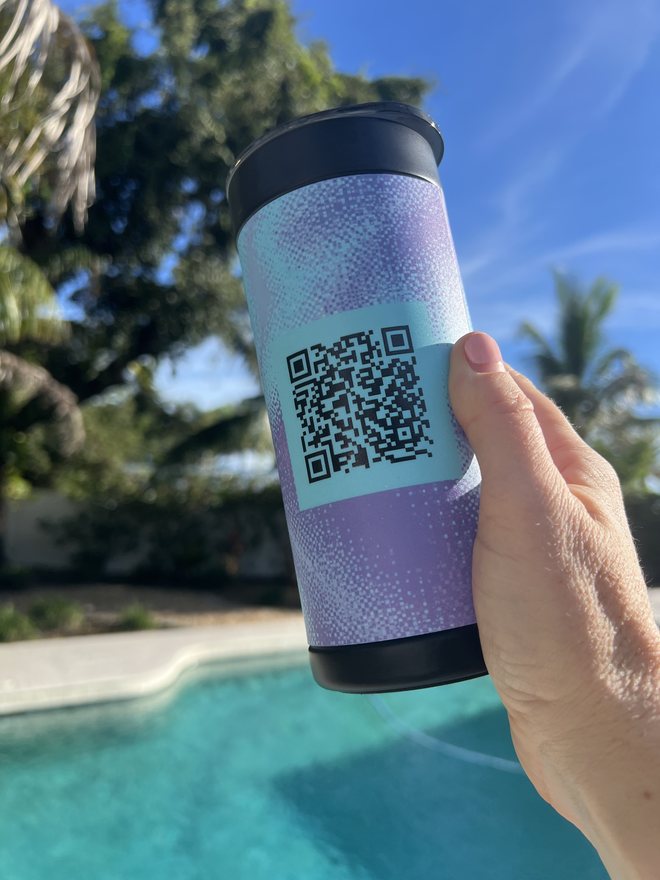 Printed QR-panel design, photographed outdoors.