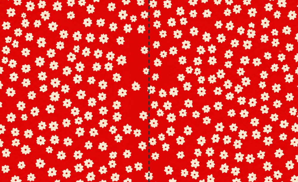 Two copies of the pattern placed side by side, with a dashed line where the right edge meets the left edge; the flowers continue across it.